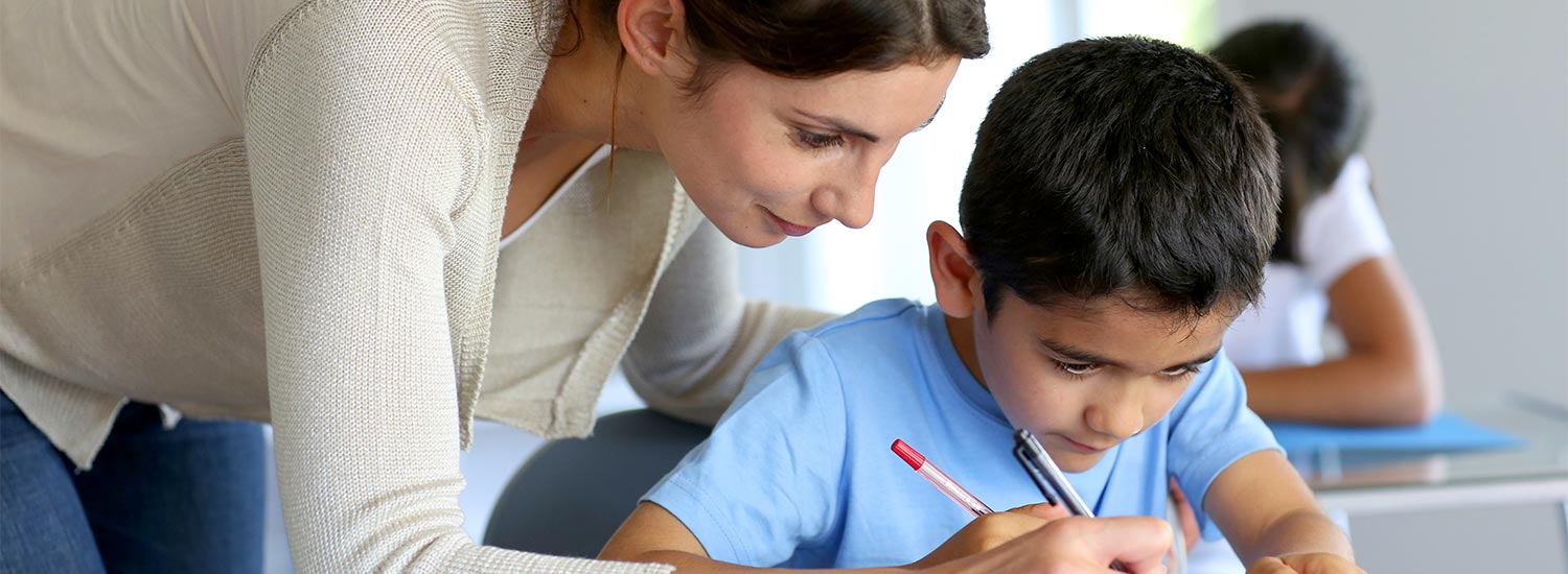 Teacher Helping Student